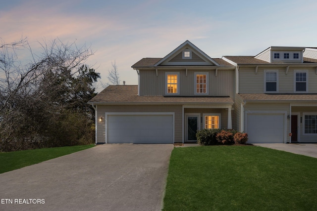 view of front of property with a front yard and driveway