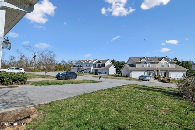 view of yard with a residential view