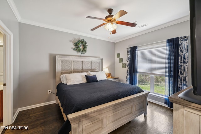 bedroom featuring visible vents, a ceiling fan, dark wood finished floors, crown molding, and baseboards