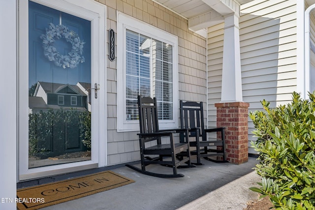 property entrance with a porch