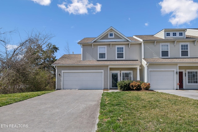 view of property featuring concrete driveway, a front yard, and a shingled roof