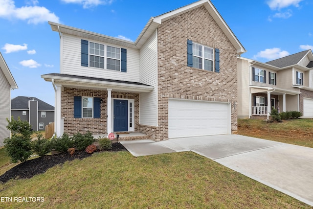 traditional home featuring driveway, brick siding, a front lawn, and an attached garage