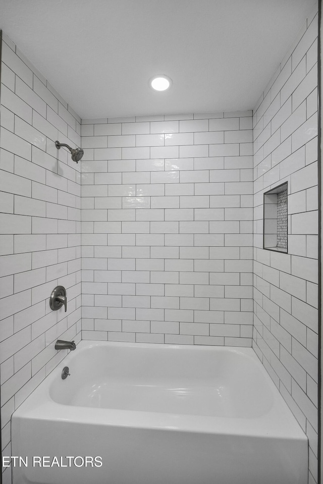 full bath with bathing tub / shower combination