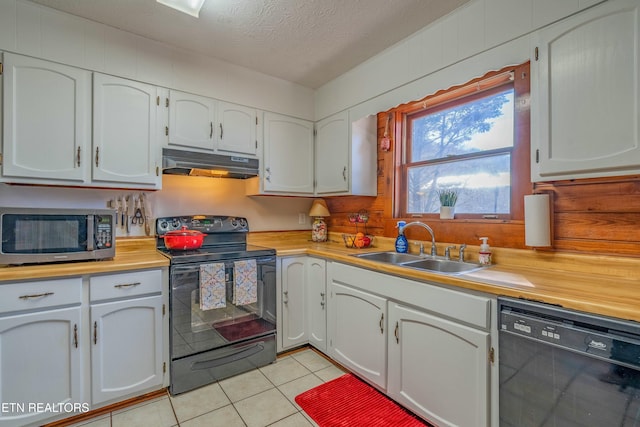 kitchen with a textured ceiling, under cabinet range hood, a sink, light countertops, and black appliances