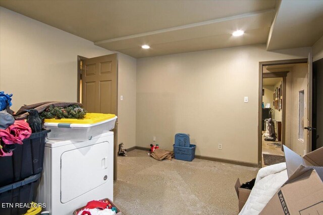 laundry area with laundry area, baseboards, washer / clothes dryer, and recessed lighting