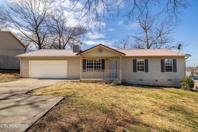 view of front of property with metal roof, an attached garage, covered porch, driveway, and crawl space