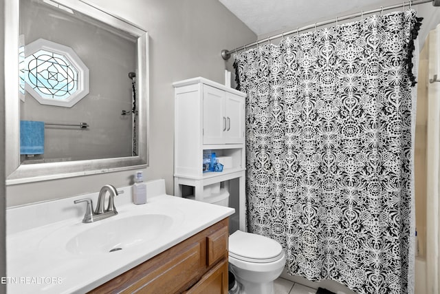 full bathroom featuring curtained shower, tile patterned flooring, vanity, and toilet