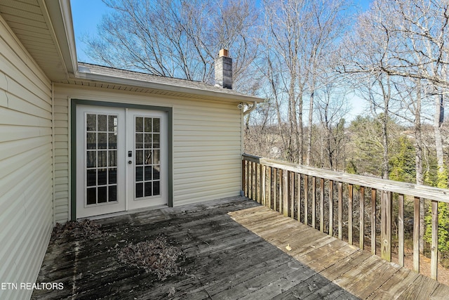 wooden terrace featuring french doors