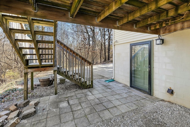 view of patio / terrace featuring stairs