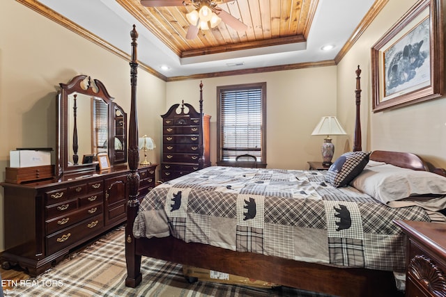 carpeted bedroom with visible vents, a raised ceiling, wood ceiling, and crown molding