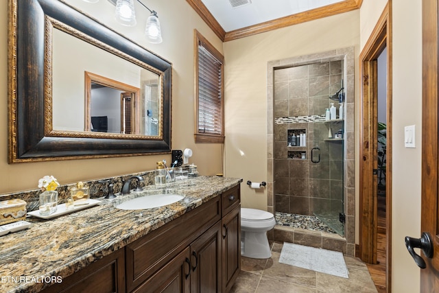 full bathroom with crown molding, visible vents, toilet, a shower stall, and vanity