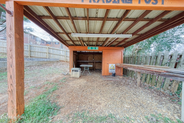 view of patio featuring fence