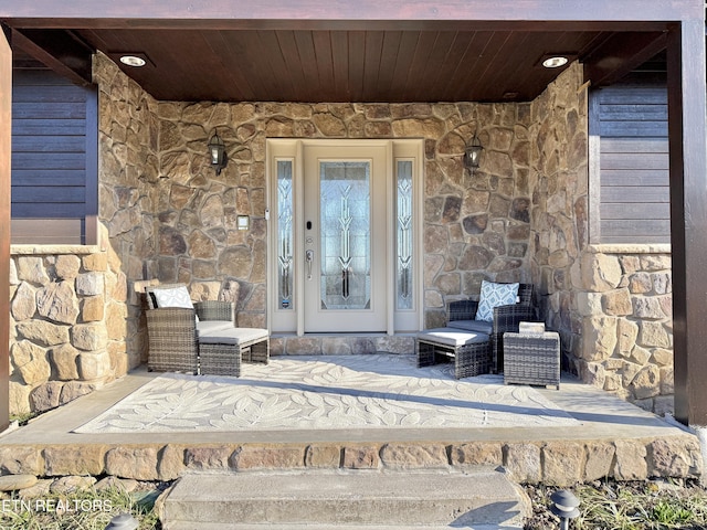 entrance to property with a porch