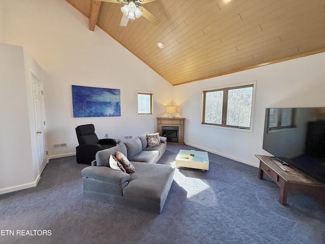 living area with dark carpet, a fireplace, wooden ceiling, and baseboards