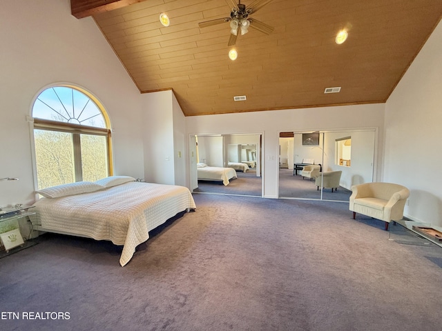 bedroom with high vaulted ceiling, visible vents, carpet flooring, and beamed ceiling