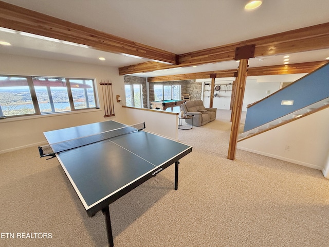 recreation room featuring recessed lighting, baseboards, beamed ceiling, and carpet flooring