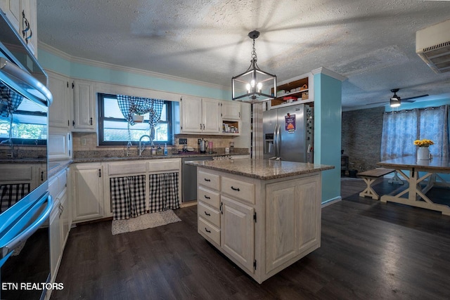 kitchen with a kitchen island, a sink, appliances with stainless steel finishes, dark wood-style floors, and open shelves