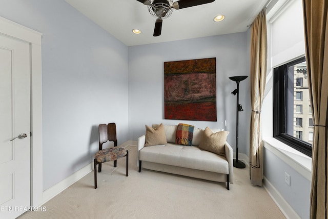 living area featuring a ceiling fan, recessed lighting, carpet, and baseboards