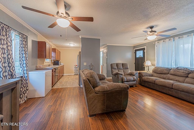 living room with crown molding, a textured ceiling, ceiling fan, and wood finished floors