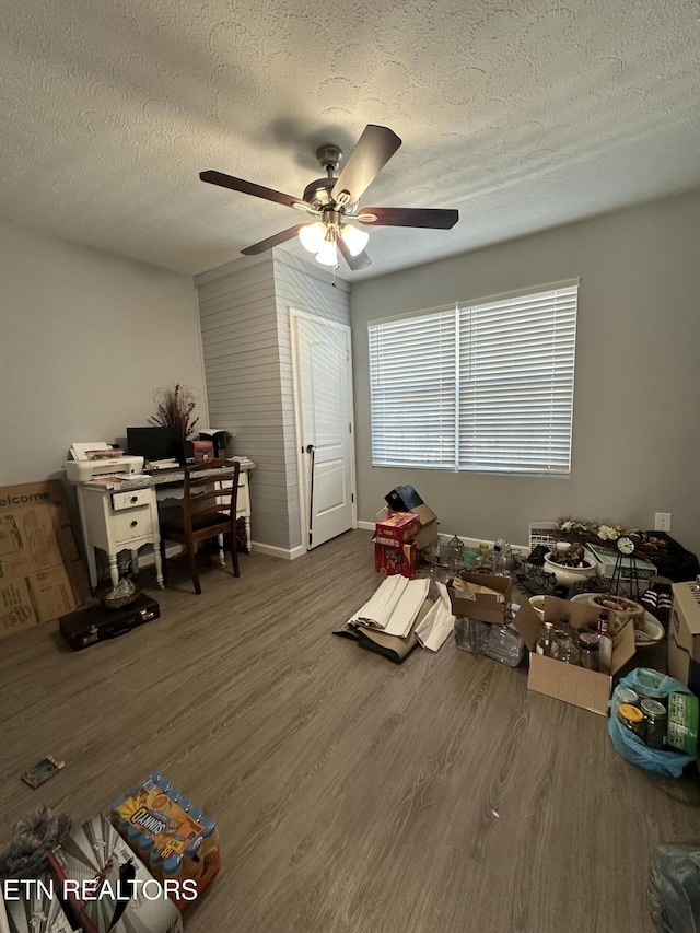 362 Valley View Rd, Lafollette, TN 37766 - playroom featuring a textured ceiling, wood finished floors, ceiling fan, and baseboards
