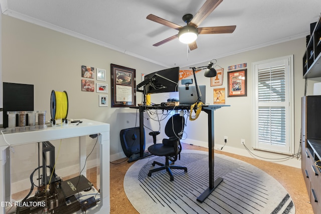 home office featuring baseboards, a ceiling fan, and crown molding