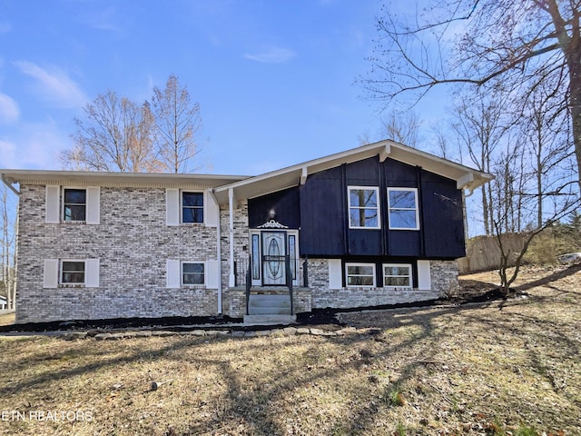 bi-level home with brick siding