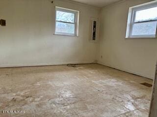 spare room featuring ornamental molding