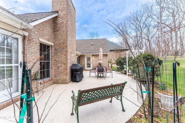 view of patio / terrace with fence and grilling area