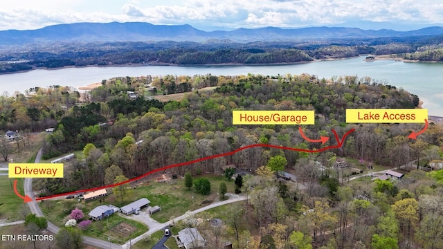 1435 Old Chisholm Trl, Dandridge, TN 37725 - view of property location featuring a water and mountain view and a heavily wooded area