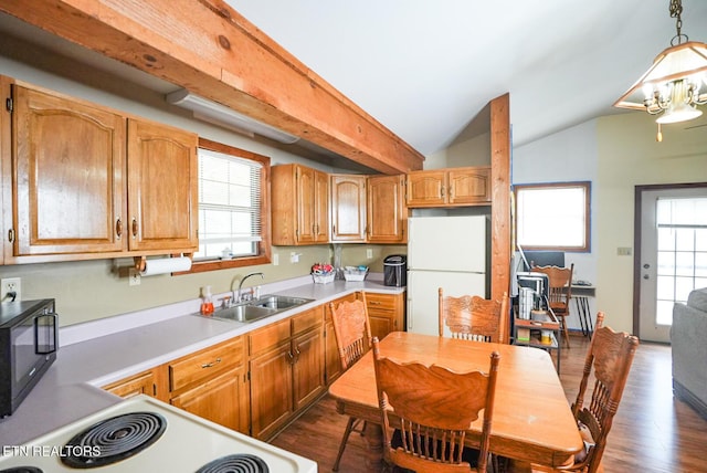 1435 Old Chisholm Trl, Dandridge, TN 37725 - kitchen featuring freestanding refrigerator, a sink, black microwave, stove, and vaulted ceiling