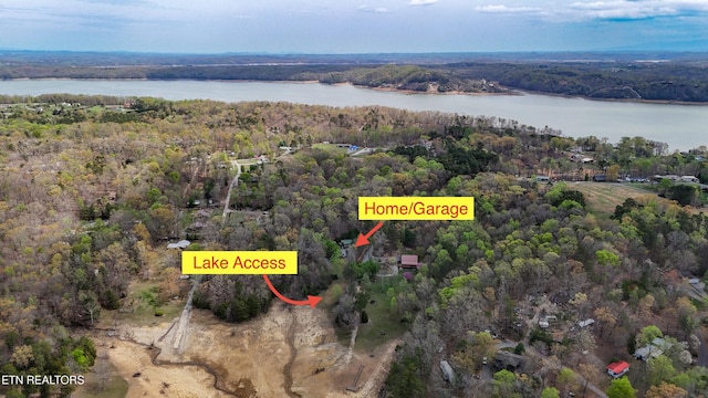 1435 Old Chisholm Trl, Dandridge, TN 37725 - aerial overview of property's location featuring a heavily wooded area and a large body of water