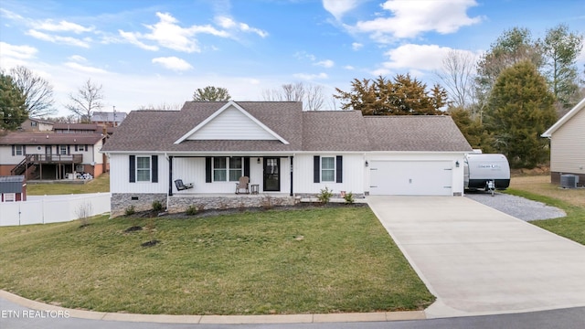 view of front facade with a front lawn, covered porch, roof with shingles, concrete driveway, and crawl space