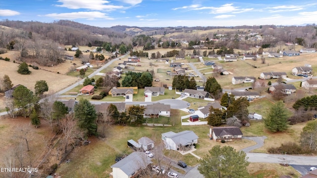 birds eye view of property with a residential view