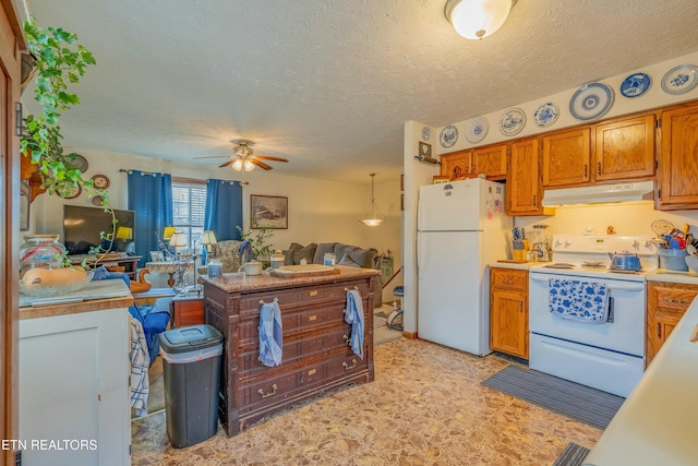 kitchen with under cabinet range hood, open floor plan, white appliances, light countertops, and ceiling fan