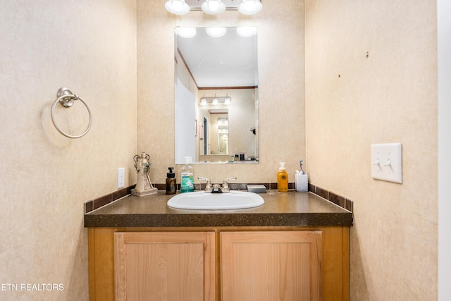344 Johnson Farm Rd, Maynardville, TN 37807 - bathroom featuring crown molding and vanity