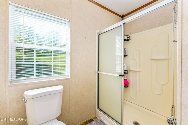 344 Johnson Farm Rd, Maynardville, TN 37807 - full bathroom featuring crown molding, toilet, and a shower stall