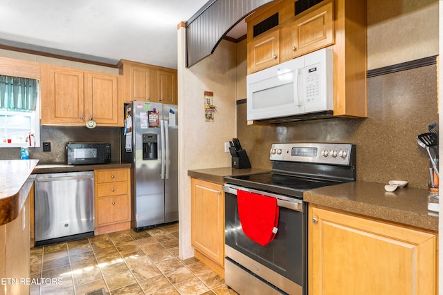 344 Johnson Farm Rd, Maynardville, TN 37807 - kitchen with dark countertops, appliances with stainless steel finishes, and tasteful backsplash