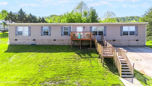344 Johnson Farm Rd, Maynardville, TN 37807 - view of front of property featuring crawl space, a wooden deck, stairs, and a front lawn