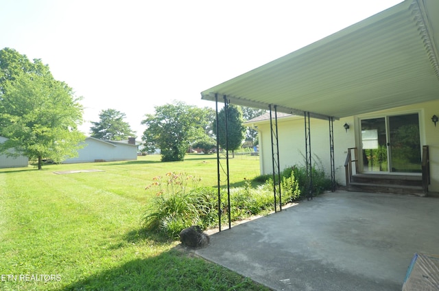 view of yard featuring entry steps
