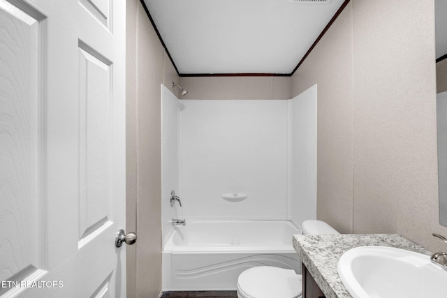 bathroom featuring visible vents, toilet, ornamental molding, tub / shower combination, and vanity