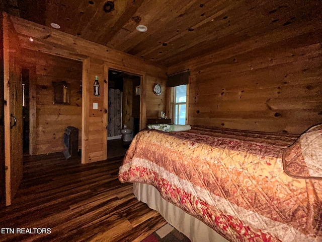 bedroom with dark wood finished floors and wooden ceiling