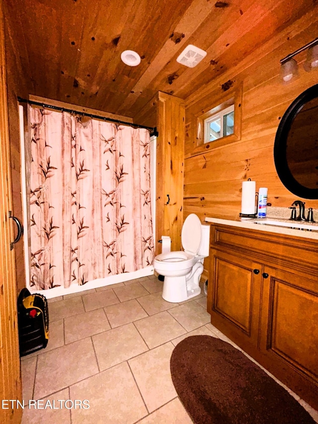 full bath with vanity, wooden walls, tile patterned flooring, wood ceiling, and toilet