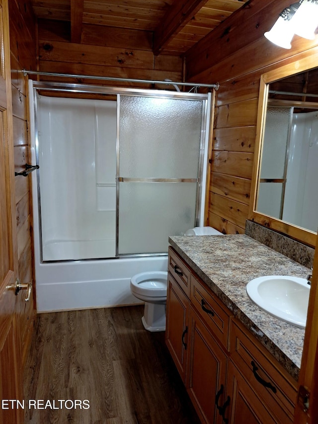 full bathroom with wooden ceiling, wooden walls, wood finished floors, vanity, and beamed ceiling