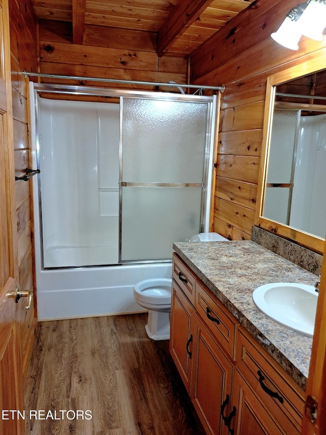 full bathroom featuring wood ceiling, wooden walls, vanity, wood finished floors, and beamed ceiling