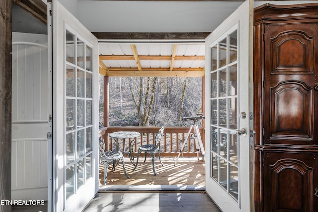 doorway featuring french doors and wood finished floors