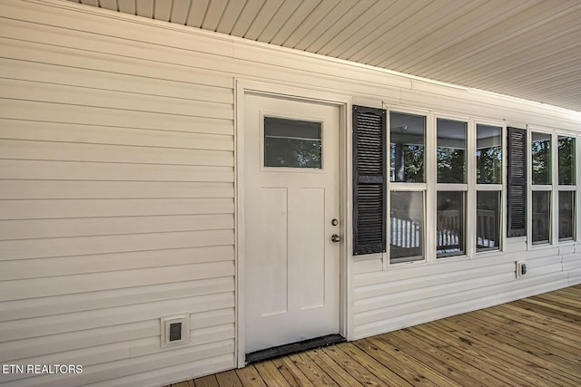 doorway to property with a deck