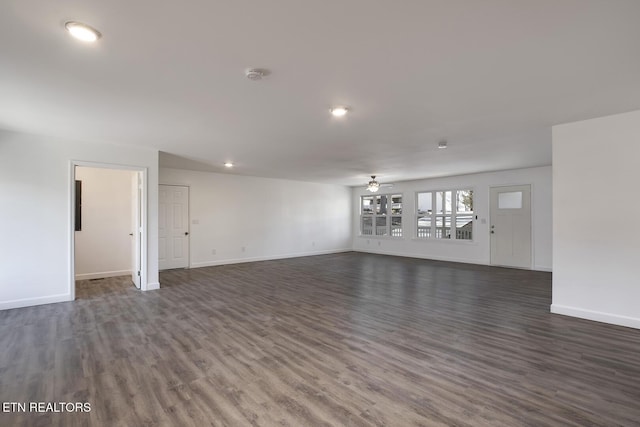 unfurnished living room featuring ceiling fan, recessed lighting, wood finished floors, and baseboards