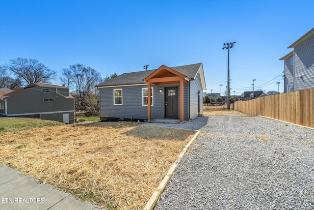 view of front of house with fence