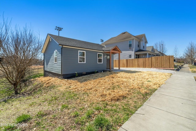 view of front of property with fence