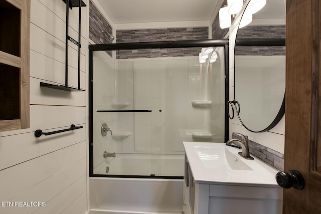 full bathroom with vanity and enclosed tub / shower combo